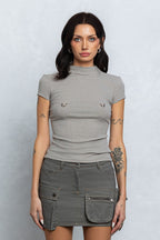PIERCED RIBBED MOCK NECK TOP