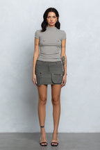 PIERCED RIBBED MOCK NECK TOP